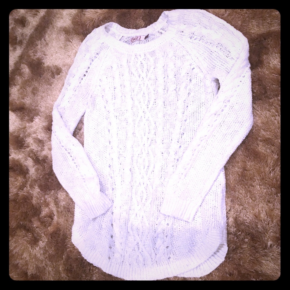 Cream colored cable knit sweater